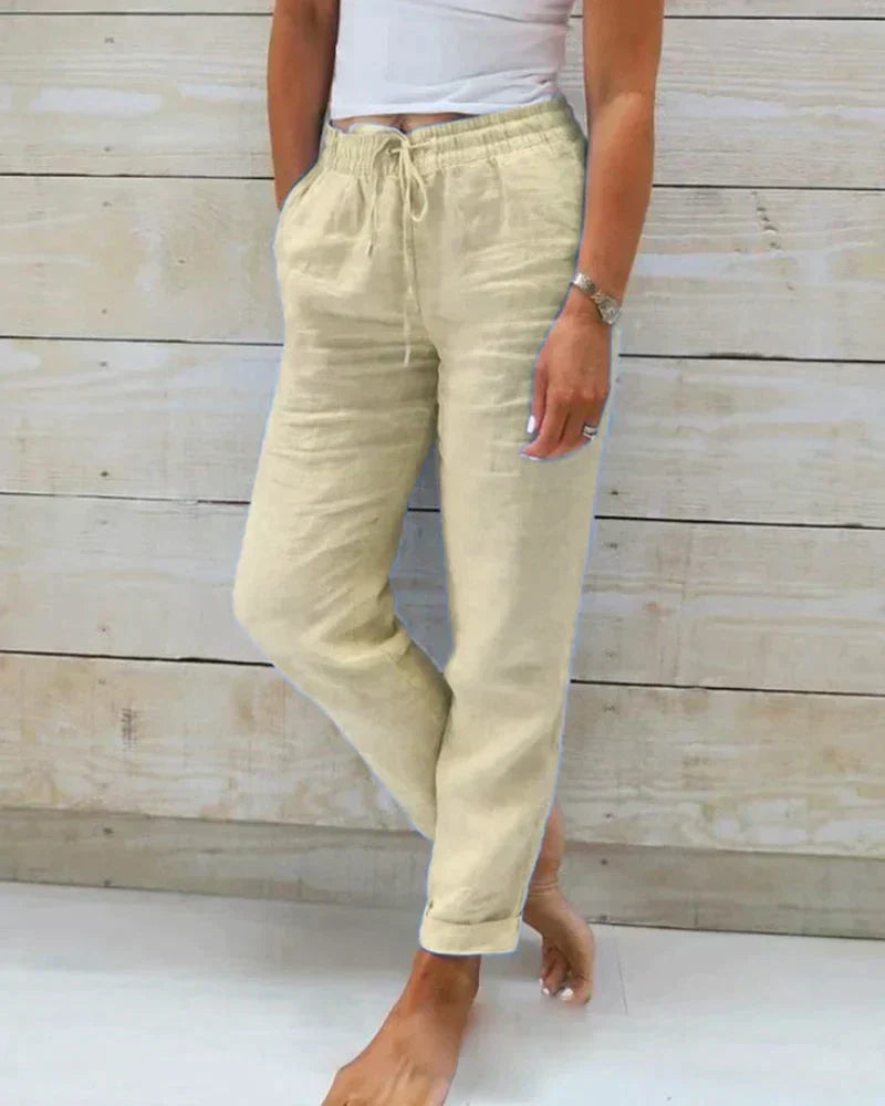 Elastic Waist Trousers with Drawstring Closure and Side Pockets
