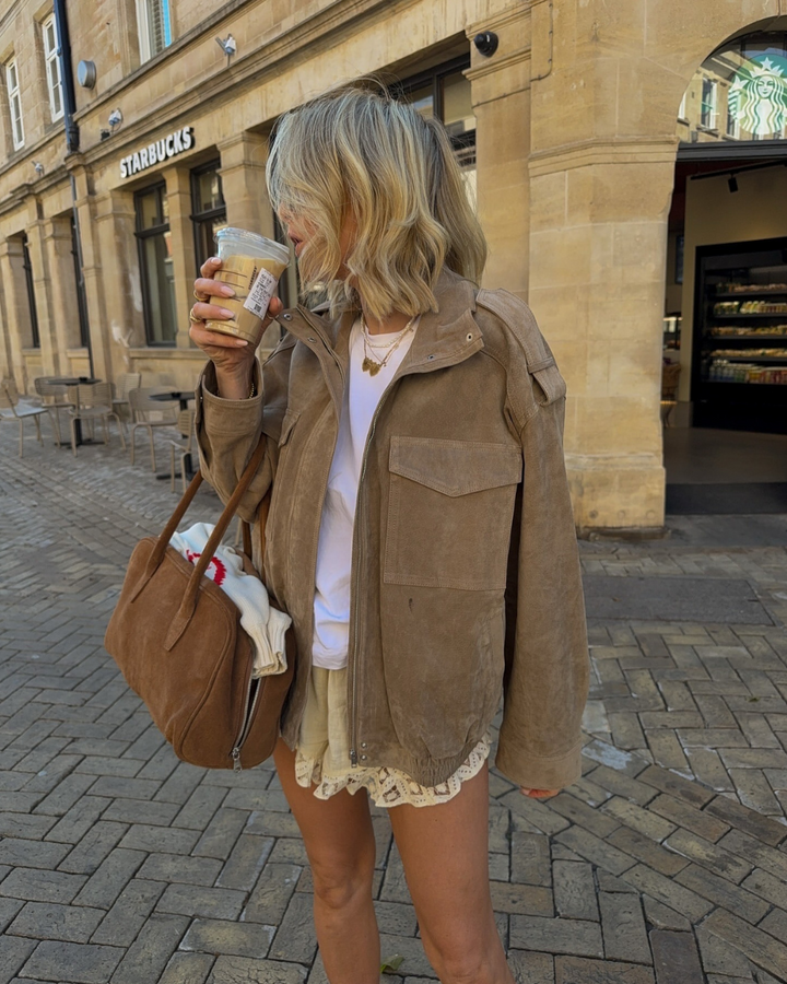 Jacket with High Collar, Front Flap Pockets, and Zip Closure