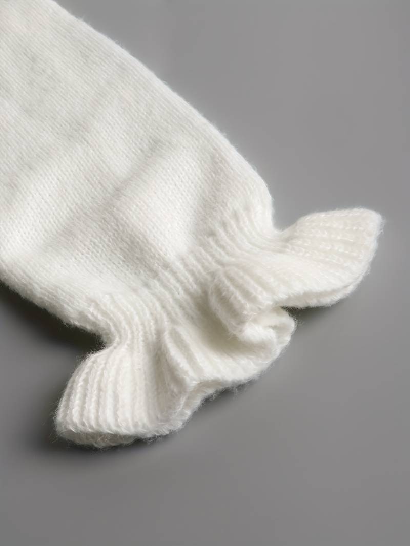 V-Neck Knitted Top with Ruffle Trim and Faux Pearl Buttons