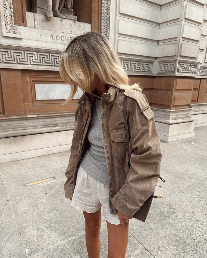 Jacket with High Collar, Front Flap Pockets, and Zip Closure