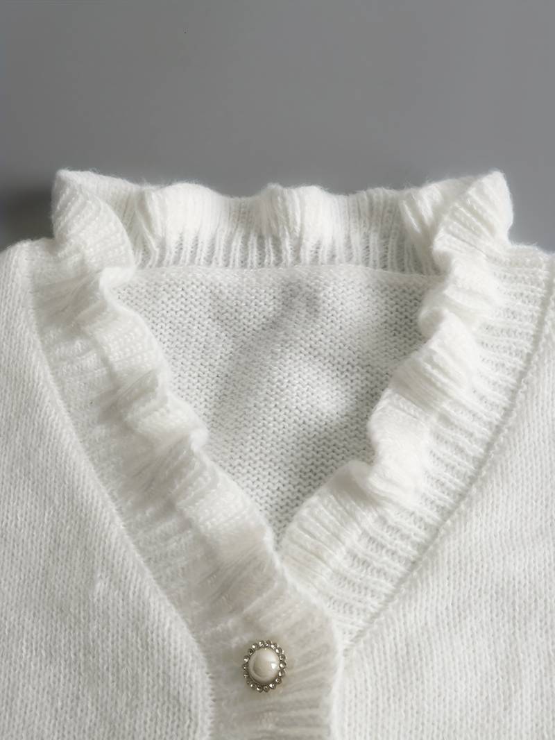 V-Neck Knitted Top with Ruffle Trim and Faux Pearl Buttons