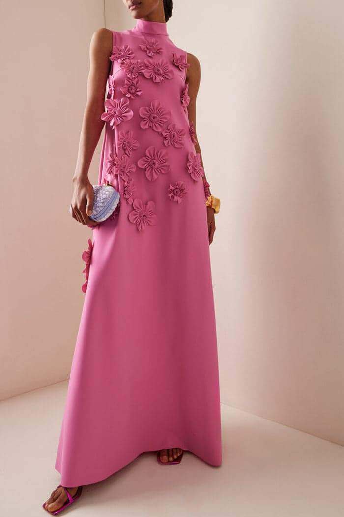 High-Neck Sleeveless Maxi Dress with Flower Embellishments and Back Tie Detail