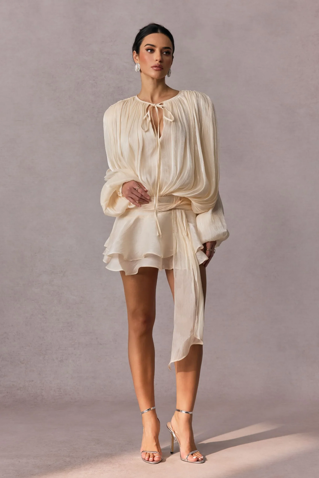 Pleated Long Sleeve Blouse with Tie-Neck Closure and Peplum Hem