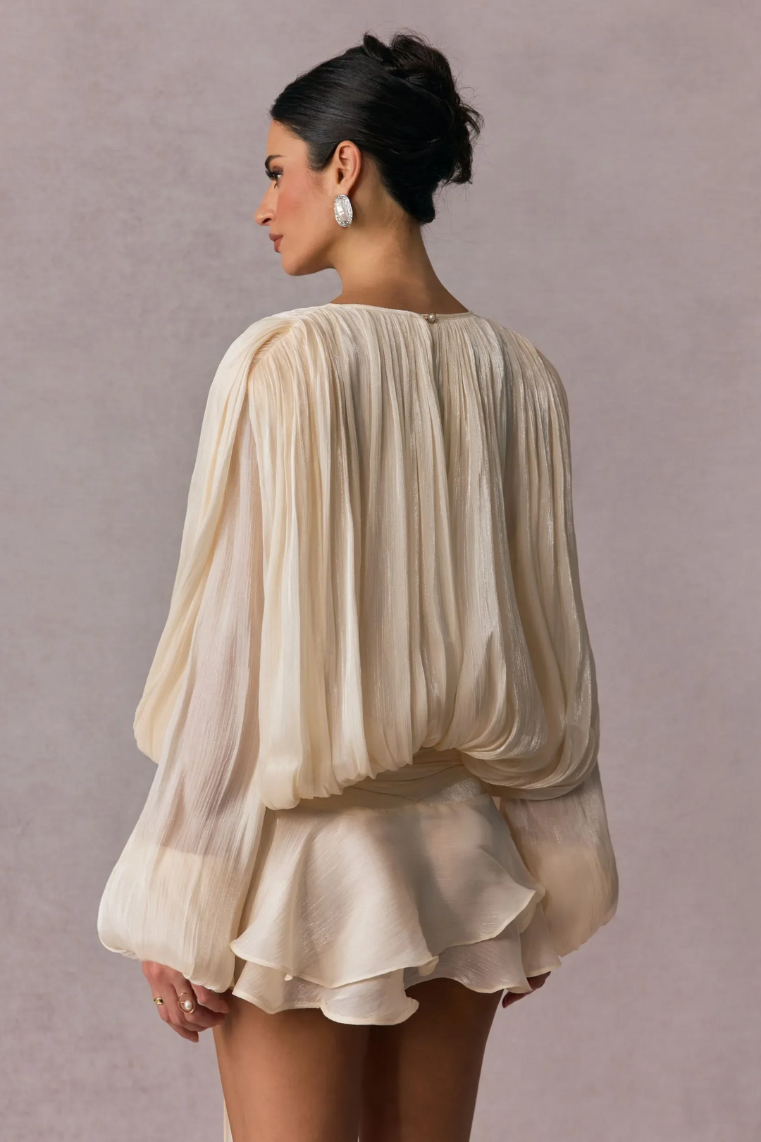 Pleated Long Sleeve Blouse with Tie-Neck Closure and Peplum Hem