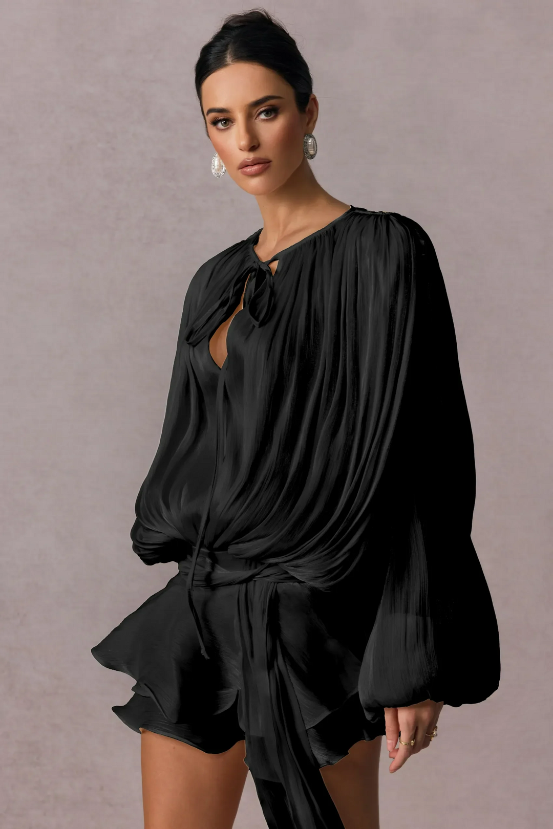 Pleated Long Sleeve Blouse with Tie-Neck Closure and Peplum Hem